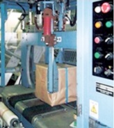 Cross strapping machine