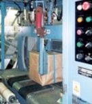 Cross strapping machine